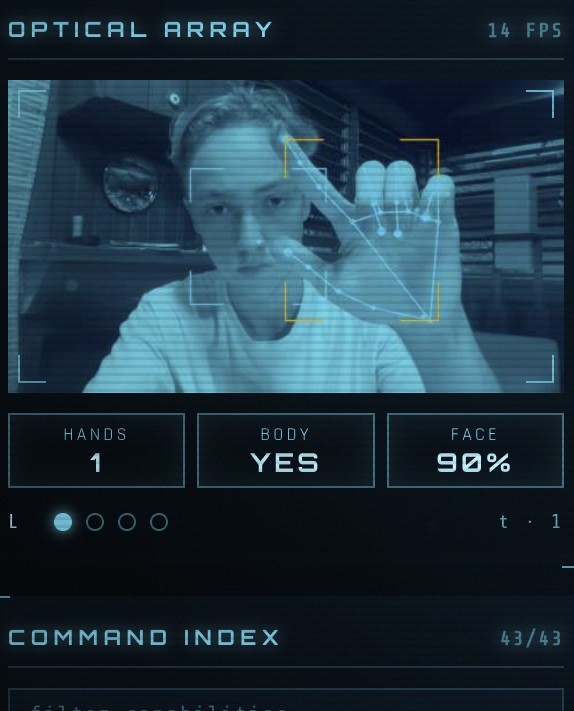The optical array panel: a live camera frame with a raised hand outlined by the tracker, and readouts for hands, body and face